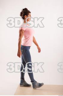 Walking pose blue jeans pink t shirt of Oxana …